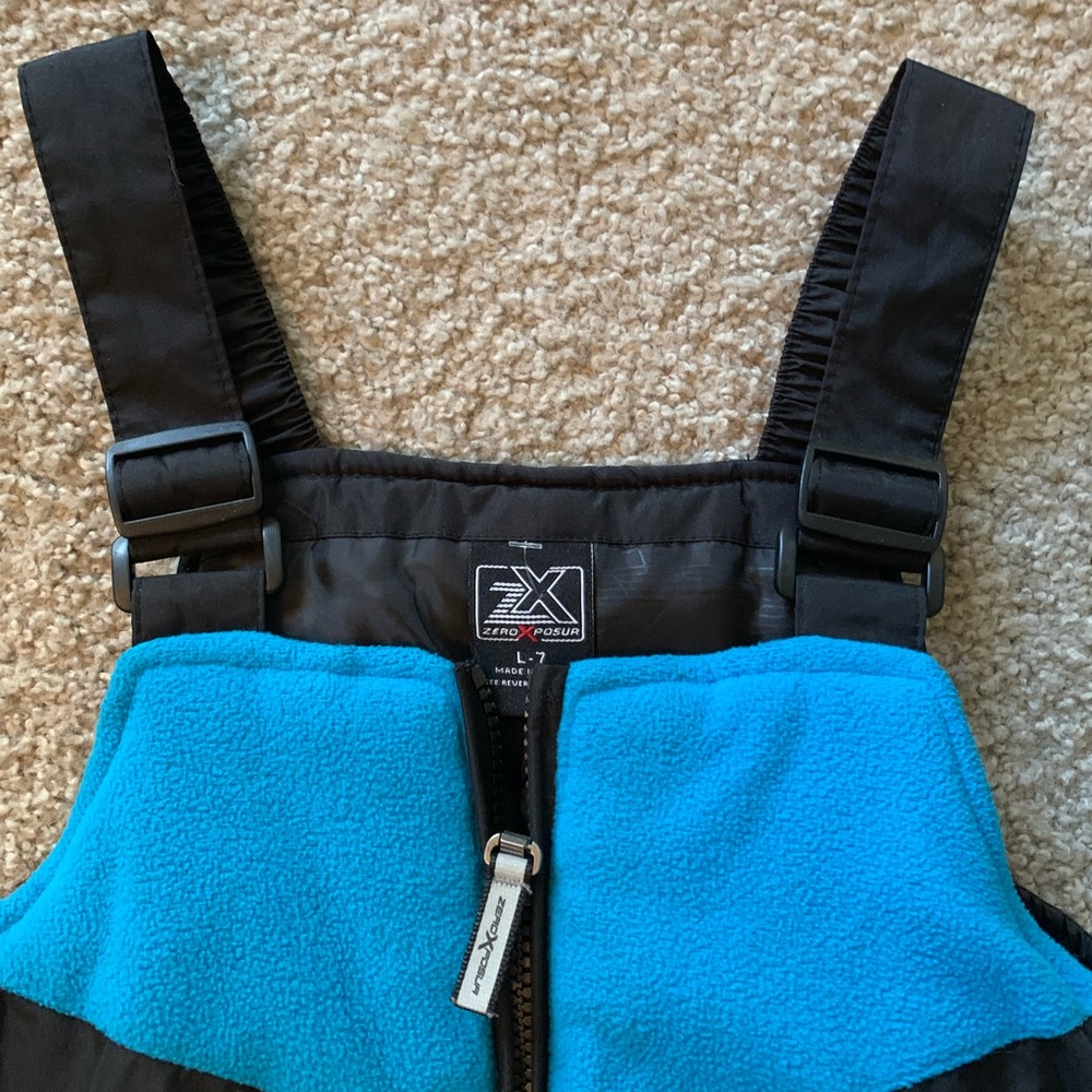 ZeroXposure kids size L-7 winter bib. Black and blue.